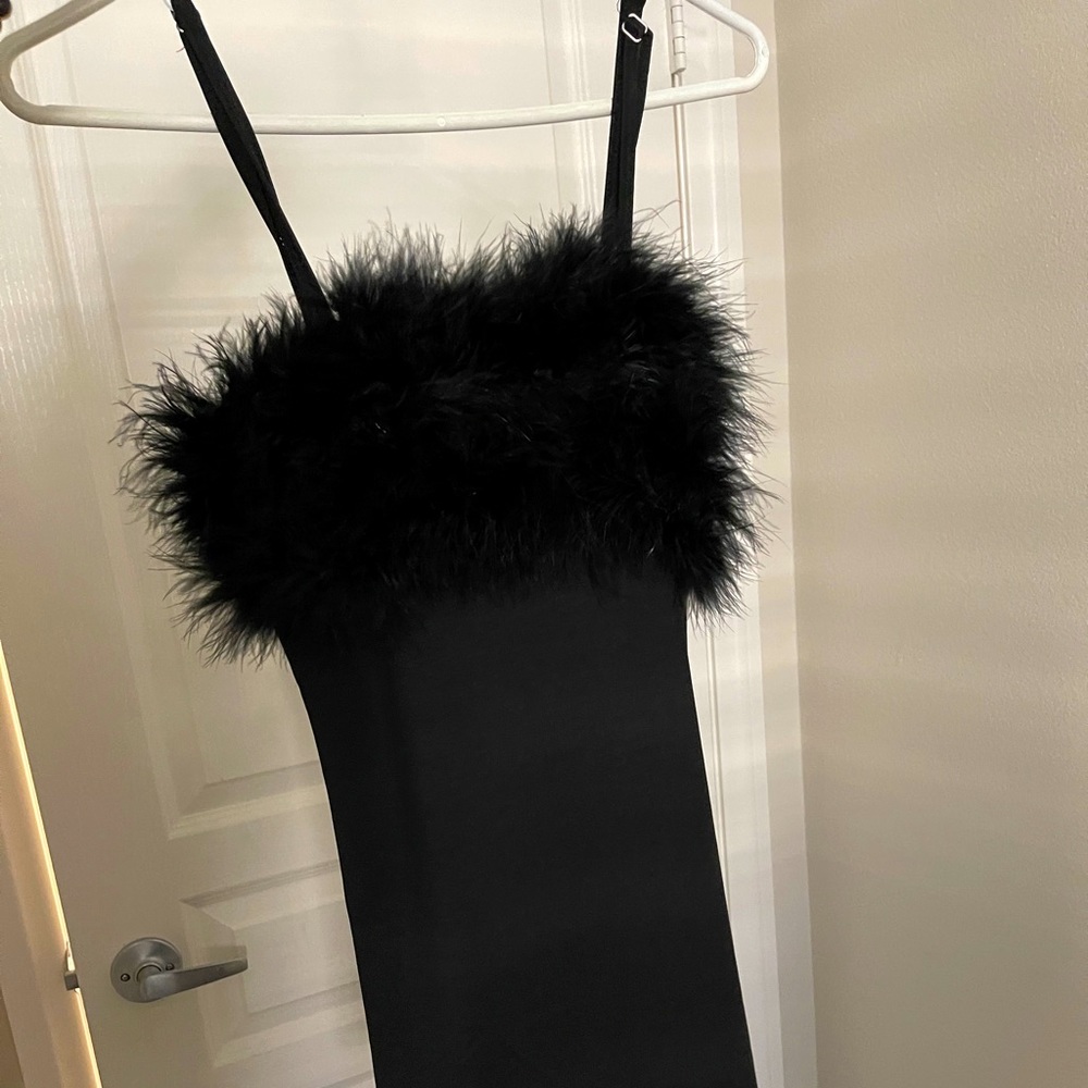 Fluffy dolls kill black dress
